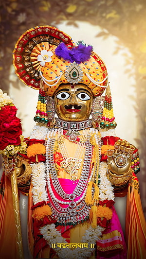 Ornate Swaminarayan Murti Adorned With Jewels, Garlands, and Traditional Turban HD phone wallpaper