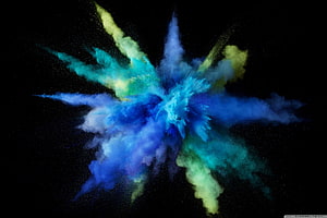 Vibrant Blue and Green Powder Explosion on Black Background HD wallpaper