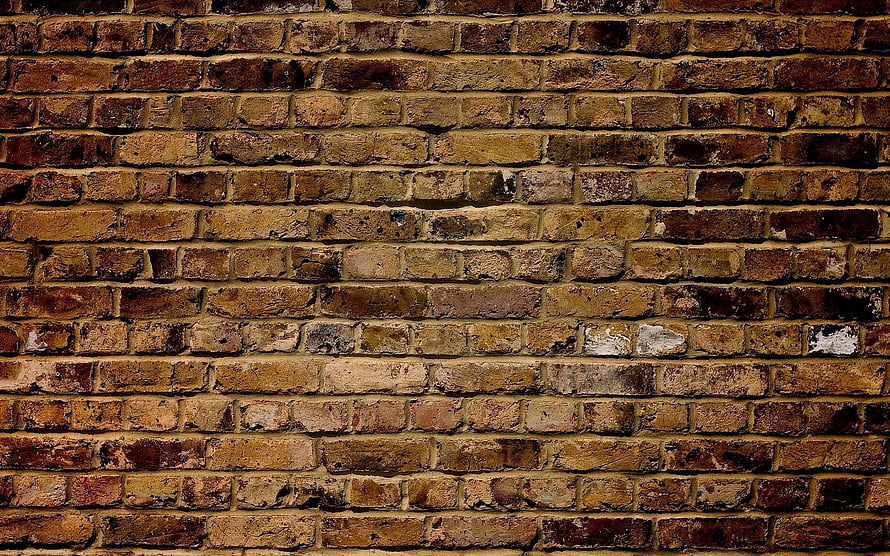 Rustic Weathered Brick Wall Texture with Warm Earthy Tones and Aged Surface Details HD wallpaper