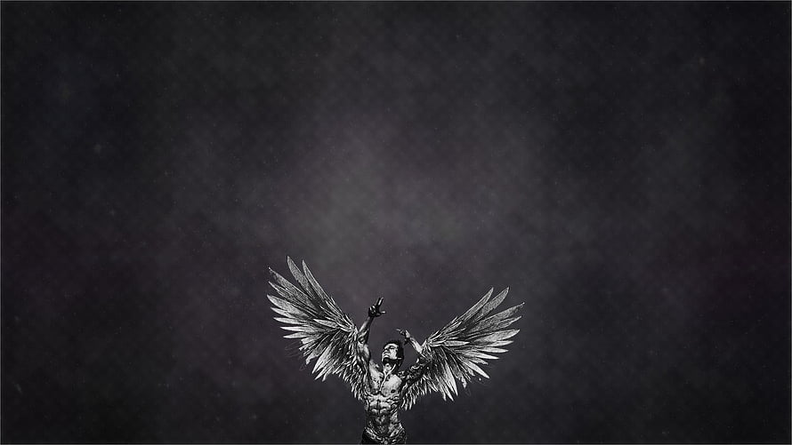 Zyzz Winged Figure Black and White Artistic Portrait with Dramatic Lighting HD wallpaper