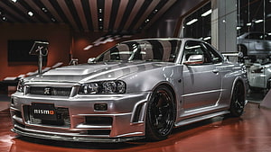 Silver Nissan Skyline R34 GT-R Nismo Showroom Display HD wallpaper