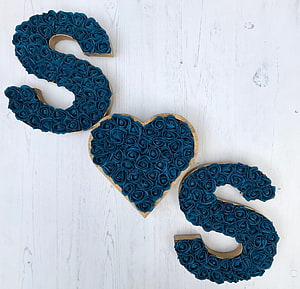 Teal Fabric Rose Letter S and Heart Wall Decor on White Wood Background HD wallpaper
