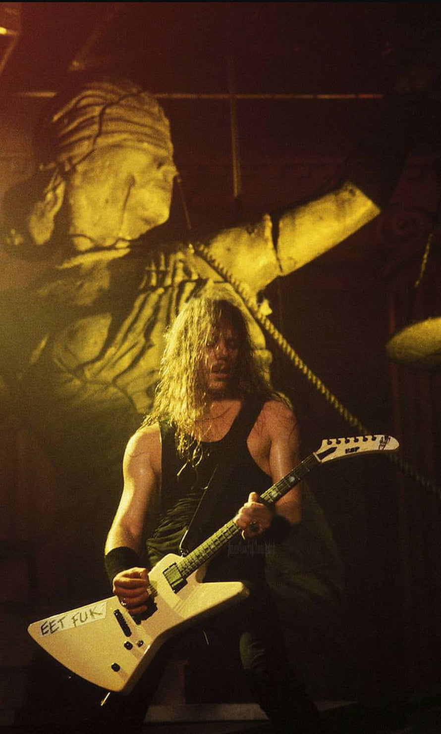 James Hetfield of Metallica performing live with a white electric guitar on stage HD phone wallpaper