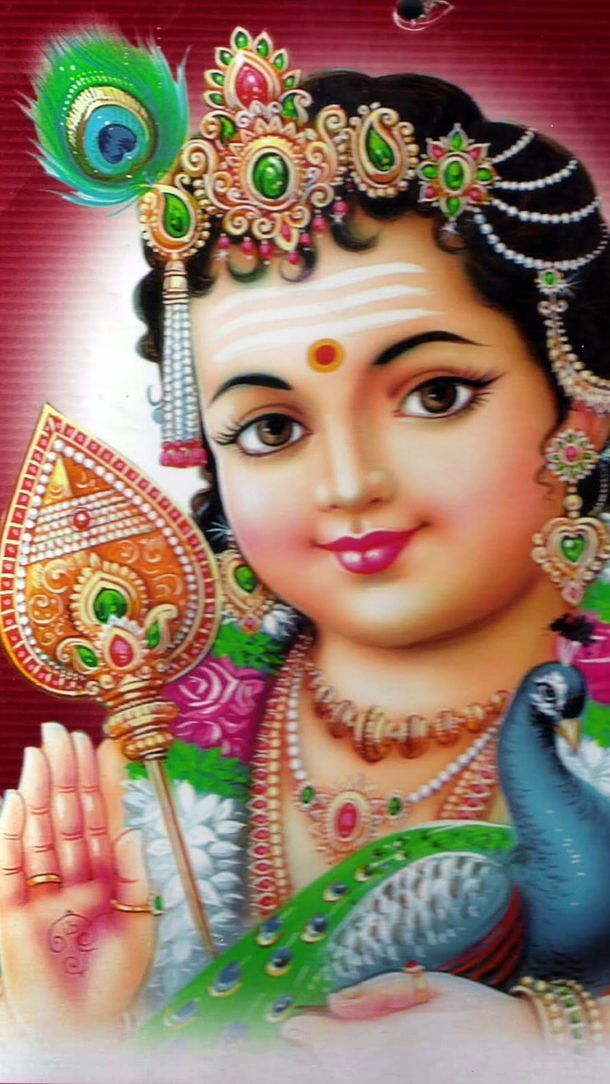 Lord Murugan Baby Portrait with Peacock Feather Crown and Traditional Jewelry HD phone wallpaper
