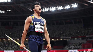 Neeraj Chopra Celebrates Historic Olympic Gold Medal Victory in Tokyo Stadium HD wallpaper