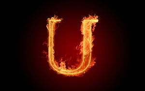 Burning Letter U in Vivid Orange Flames on a Dark Red Background HD wallpaper