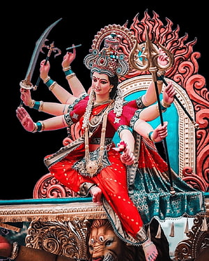 Goddess Durga Multi-Armed Deity with Sword and Trident on Lion Throne HD phone wallpaper