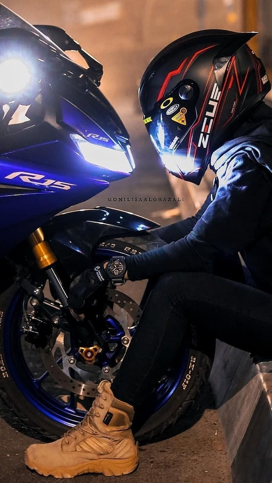 Biker in NEUE Helmet Kneeling Beside Blue Yamaha R15 Sport Motorcycle at Night HD phone wallpaper