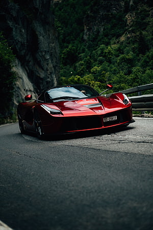 Red Ferrari LaFerrari Aperta on a Mountain Road HD phone wallpaper