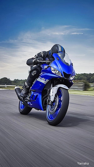Yamaha R15 Blue Sport Motorcycle Leaning Into a Turn on a Race Track HD phone wallpaper
