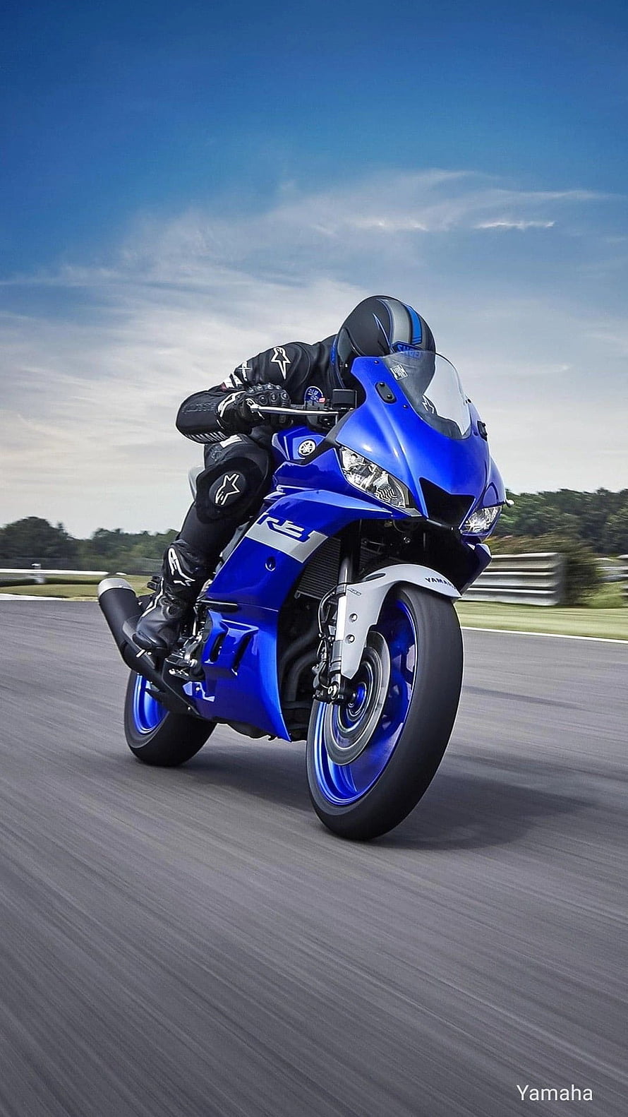 Yamaha R15 Blue Sport Motorcycle Leaning Into a Turn on a Race Track HD phone wallpaper