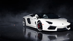 White Lamborghini Aventador Roadster on Wet Asphalt with Dramatic Fog and Studio Lighting HD wallpaper