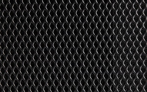 Close-up of black metal rhombic grid texture with repeating diamond pattern and industrial surface detail HD wallpaper