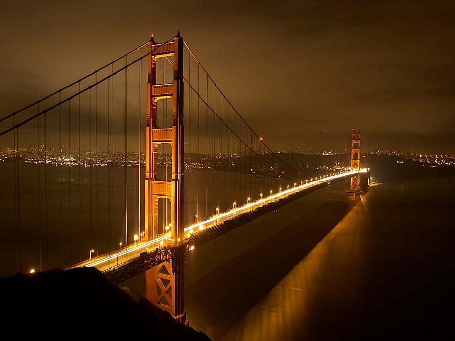 Golden Gate Bridge Illuminated at Night Over San Francisco Bay HD wallpaper