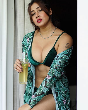 Sofia Ansari in Green Tropical Print Robe and Velvet Bra Holding a Citrus Drink HD phone wallpaper