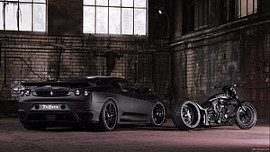 Matte Black Ferrari F430 and Custom Chopper Motorcycle in Industrial Warehouse HD wallpaper