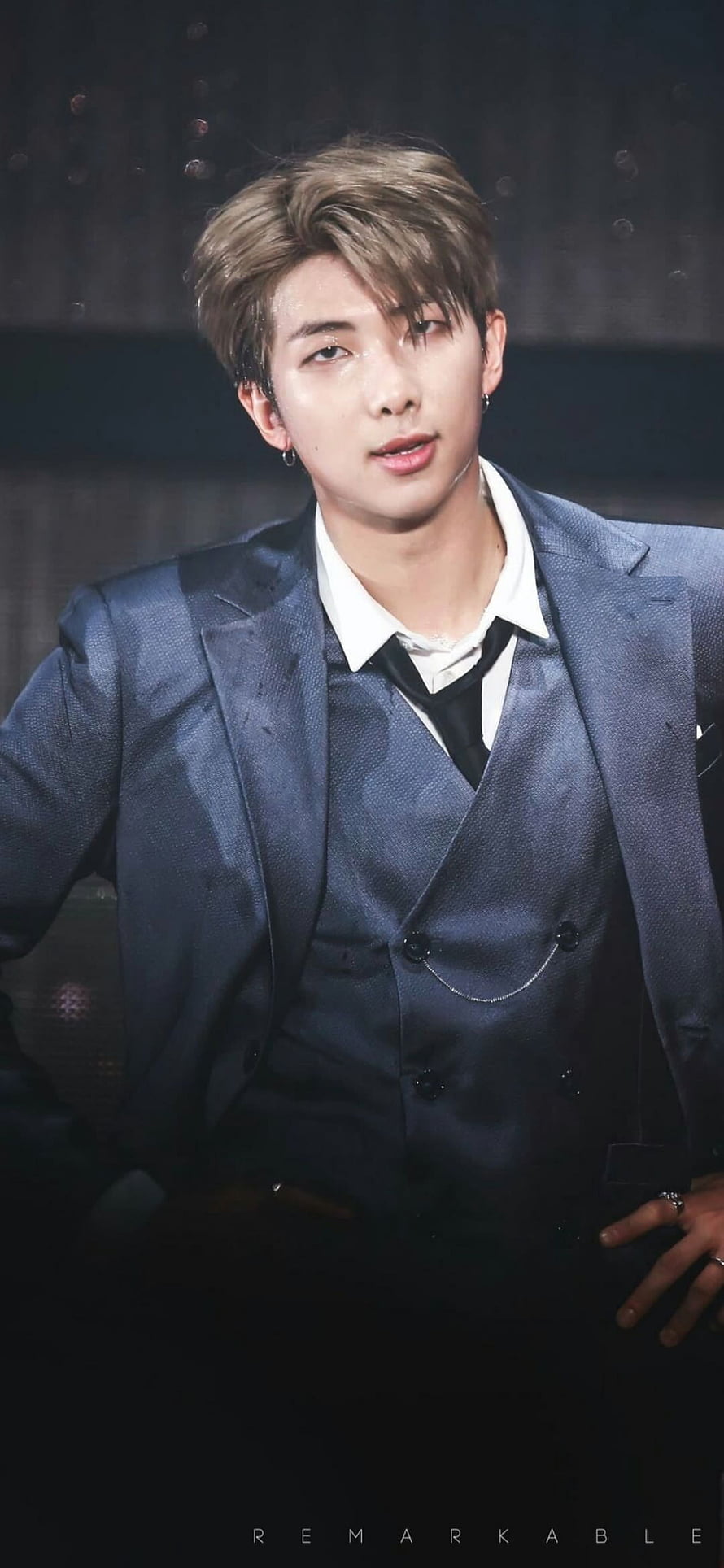 Kim Nam Joon in a Textured Navy Blue Suit with White Shirt and Black Tie HD phone wallpaper
