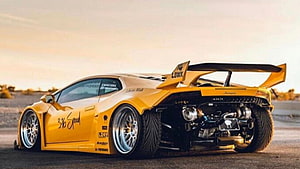Liberty Walk Widebody Kit on Yellow Lamborghini Huracan with Exposed Rear Engine HD wallpaper