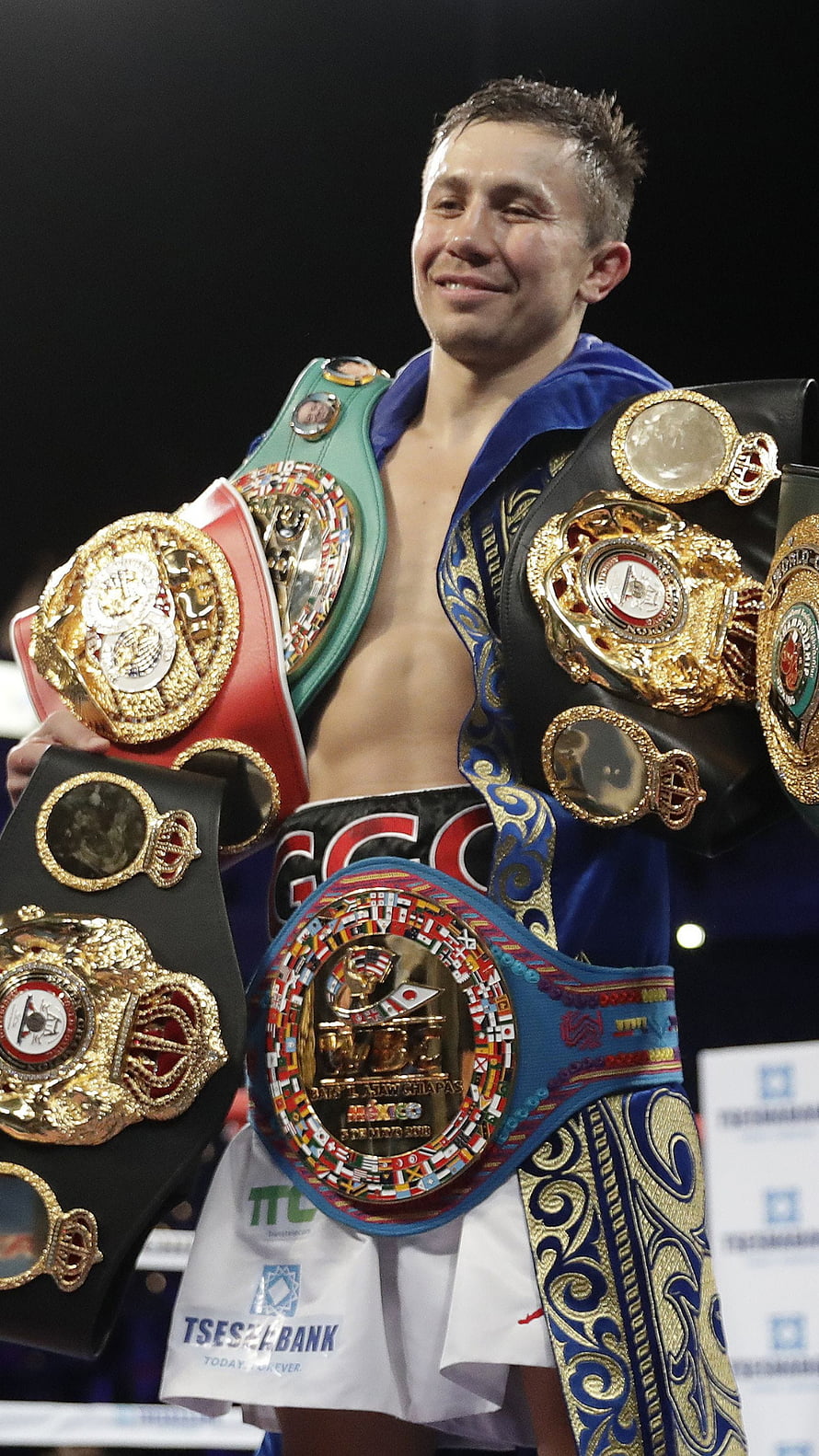 Gennady Golovkin Displaying Multiple World Boxing Championship Belts in the Ring HD phone wallpaper