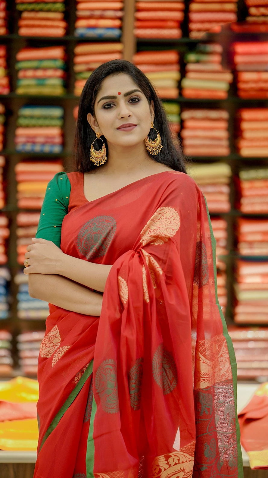 Elegant Woman in Red Banarasi Saree with Gold Jewelry in Fabric Store HD phone wallpaper